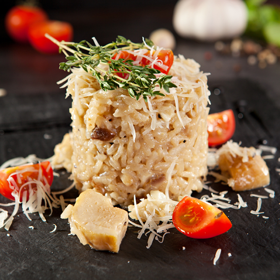 Risotto con pesce spada e pomodori ciliegini