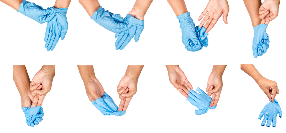 Come rimuovere in sicurezza i guanti monouso