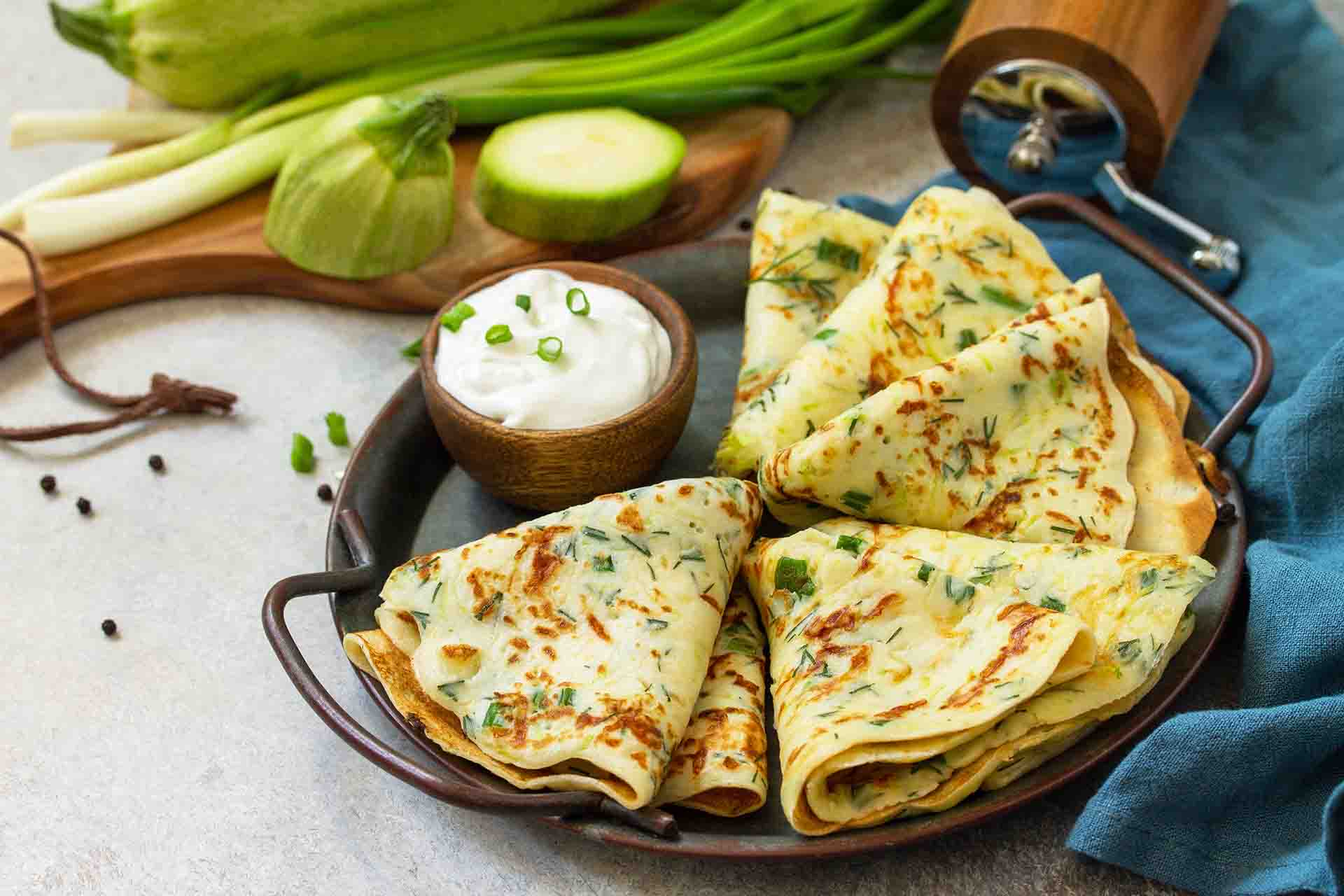 Come si preparano le crespelle con zucchine e speck